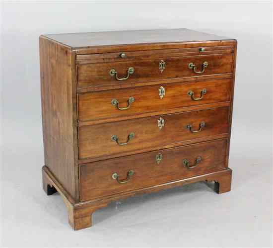 Appraisal: A George III mahogany chest with brushing slide and four