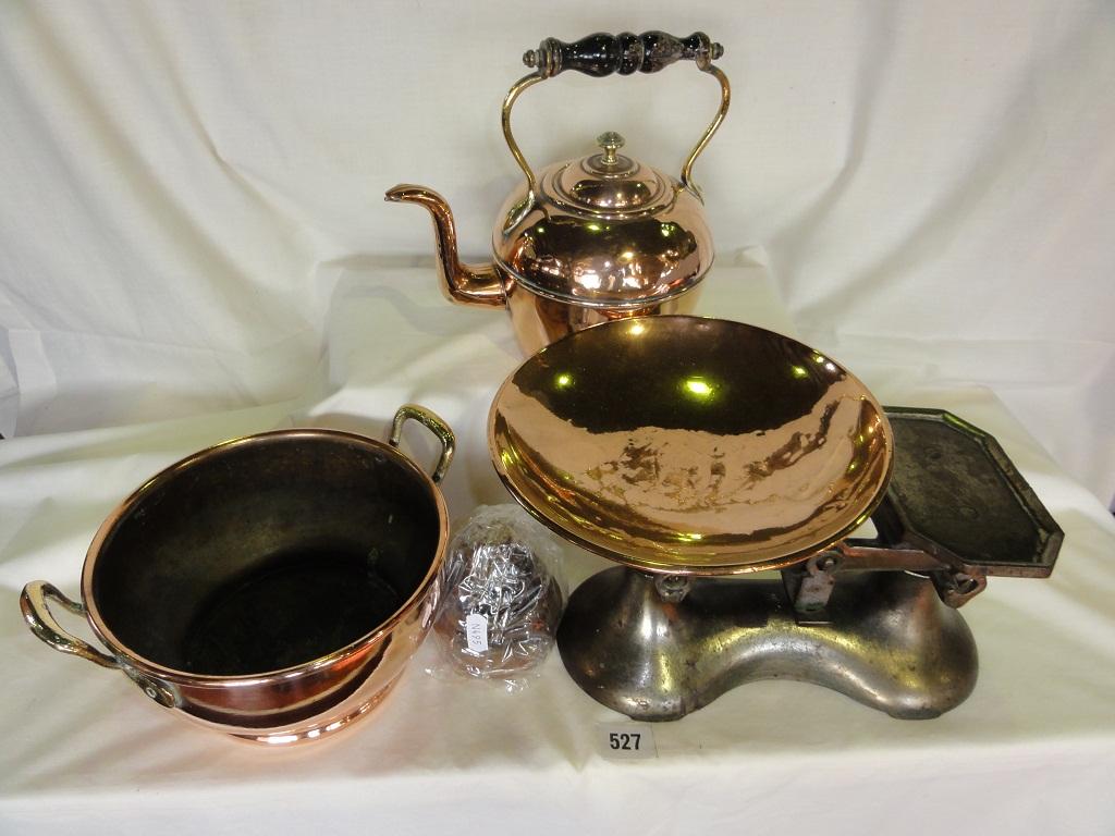 Appraisal: A copper two handled bowl with a similar copper kettle