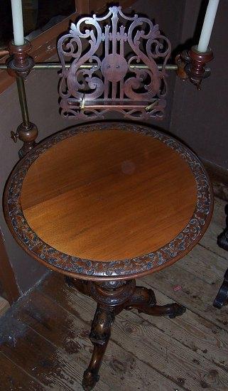 Appraisal: A Victorian mahogany reading stand the swivel arm with fret