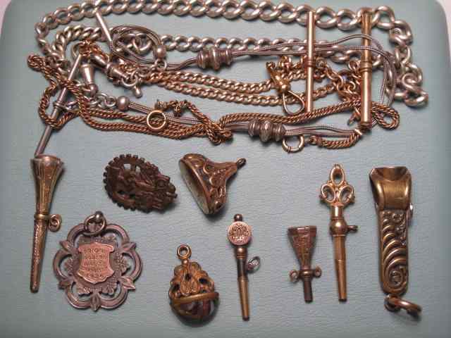 Appraisal: Lot of assorted watch chains key fobs and medals etc