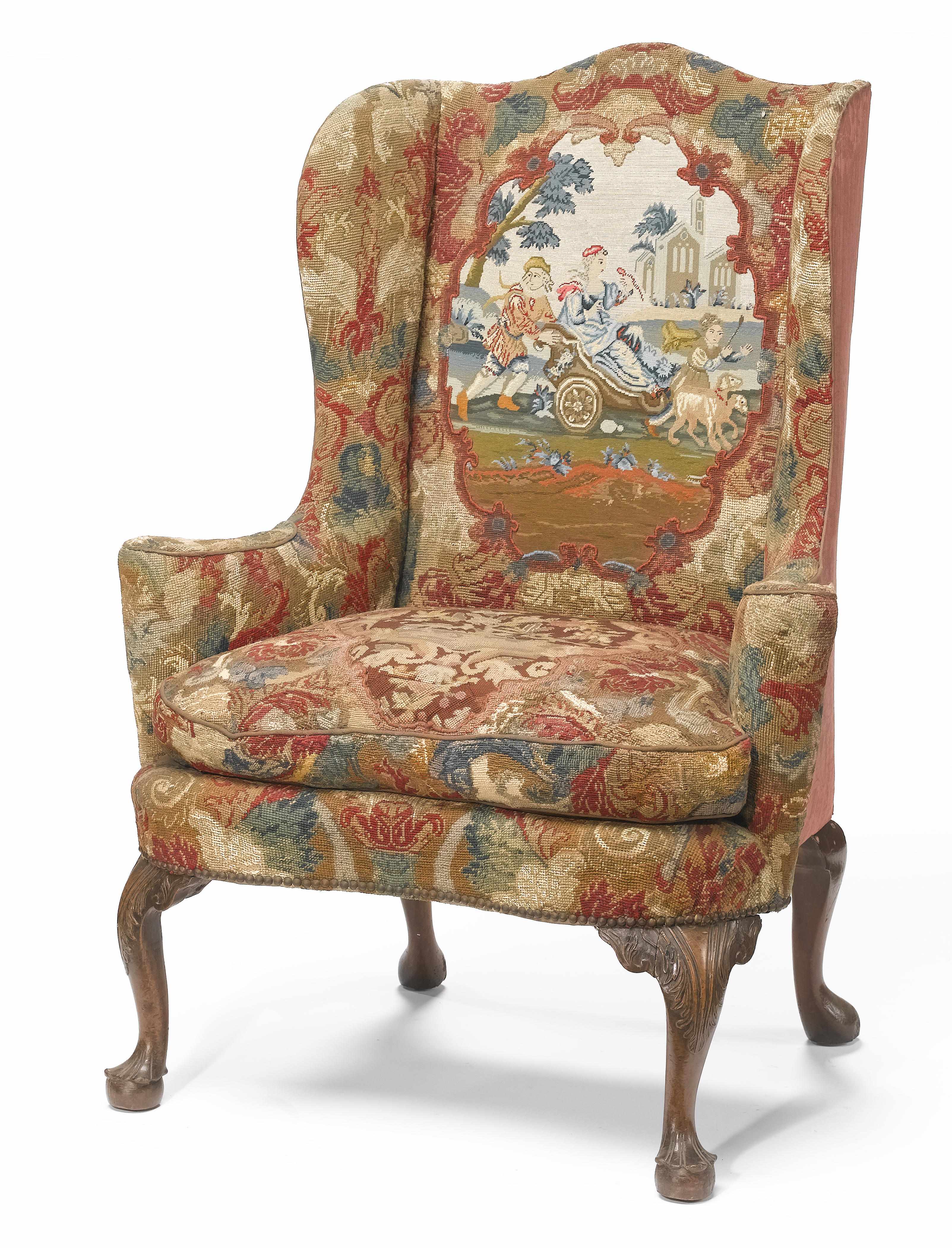 Appraisal: A George II carved walnut wing armchair second quarter th