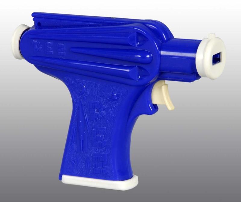 Appraisal: Space Gun Pez Dispenser Description Blue variation Includes original instruction