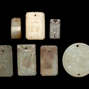 Appraisal: Seven Chinese White and Celadon Jade Carved Plaques comprising four