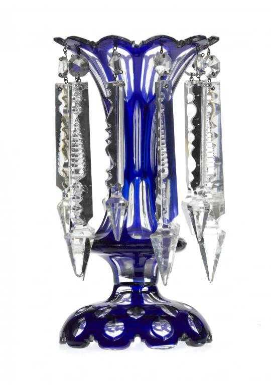 Appraisal: A CASED GLASS LUSTRE VASE cased in deep blue and