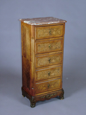 Appraisal: A small French marquetry inlaid chest of drawers late th