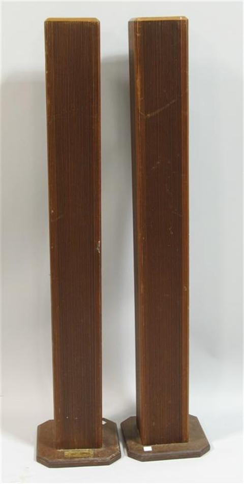 Appraisal: TWIN TOWERS WOODEN SCULPTURES With plaque inscribed Dan and David