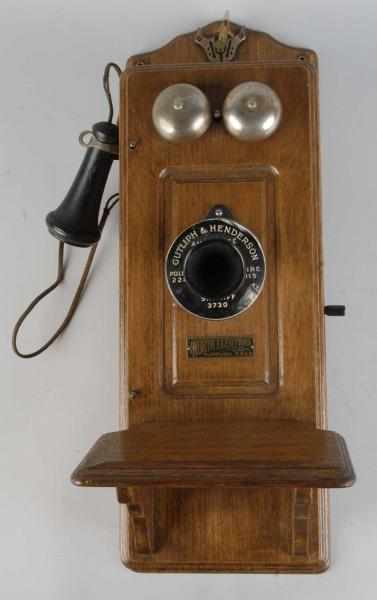 Appraisal: Oak Wall Phone By North Electric Company Description All original