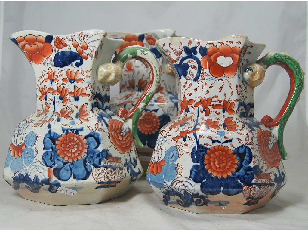 Appraisal: Three graduated th century Masons Ironstone octagonal jugs with Imari