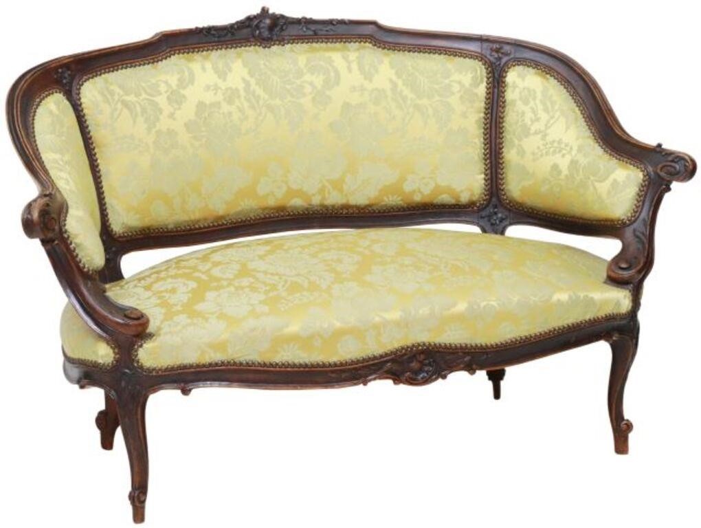 Appraisal: French Louis XV style walnut settee th c having carved