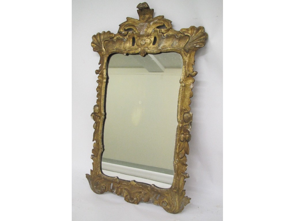 Appraisal: A mid th Century gilt decorated wall mirror bearing ornate