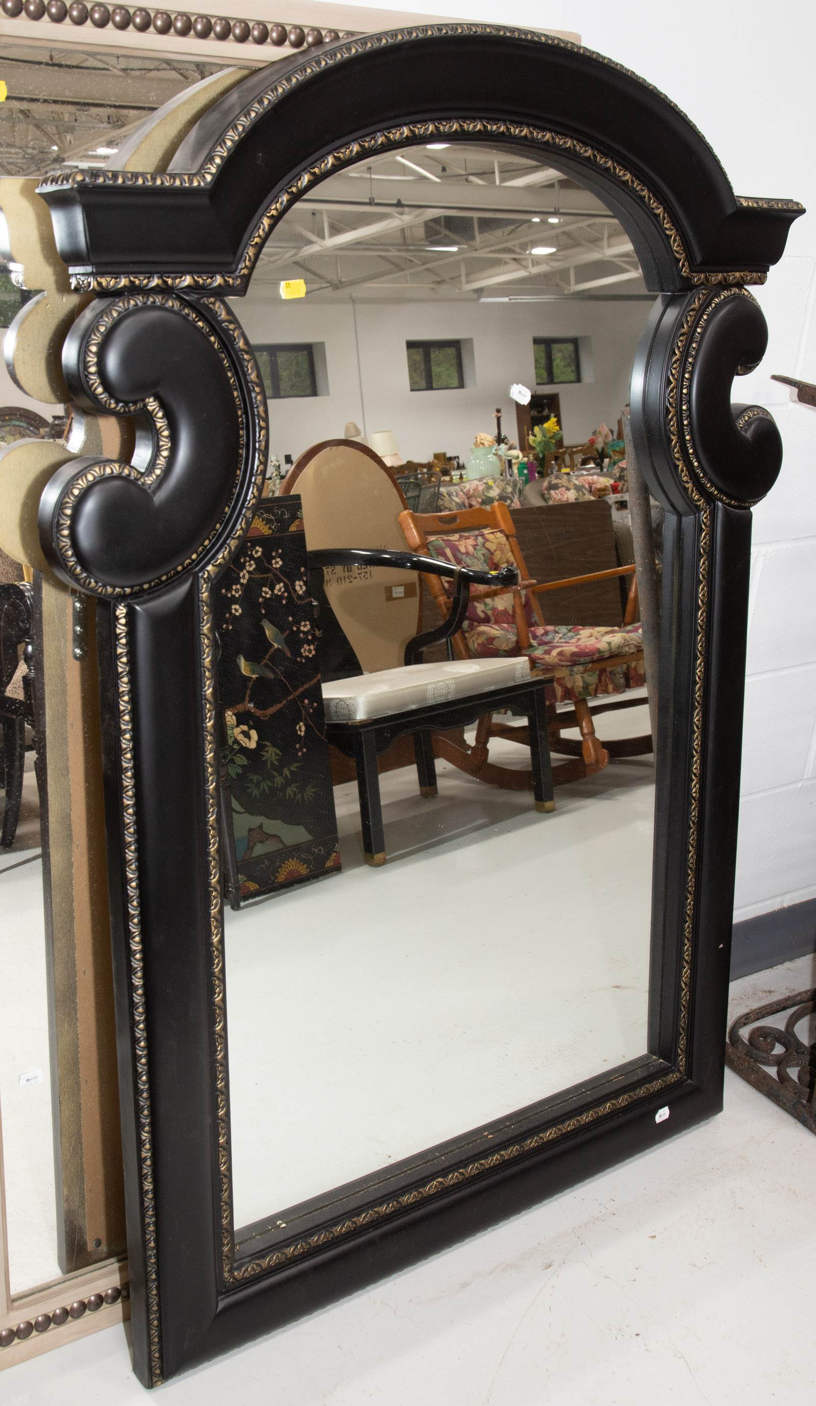 Appraisal: LARGE BAROQUE STYLE SHAPED MIRROR Modern in painted and gilt