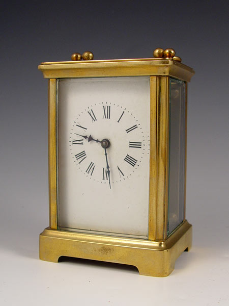 Appraisal: FRENCH BRASS CARRIAGE CLOCK Brass case with beveled glass on