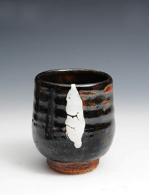 Appraisal: William Marshall British - Unomi tea bowltenmoku with white poured