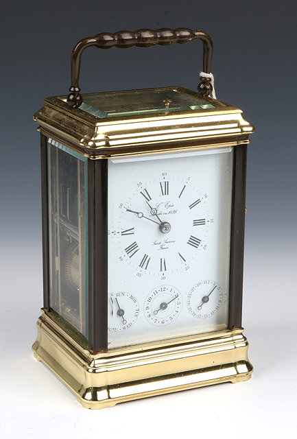 Appraisal: A FRENCH GORGE CASE BRASS REPEATER CARRIAGE CLOCK L'Ep e