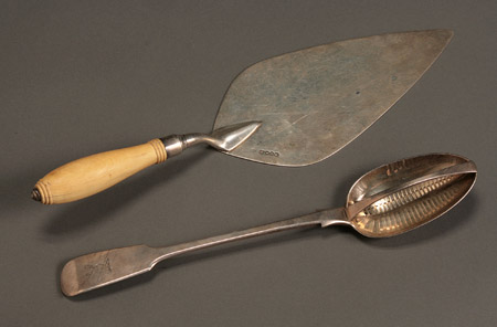 Appraisal: Victorian Ivory Handle Silver Trowel and a Strainer Spoon The