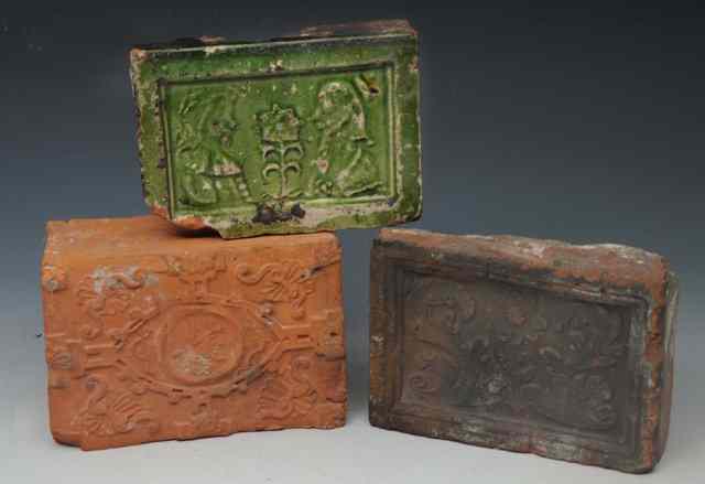 Appraisal: THREE EARLY NETHERLANDS HEARTH BRICKS or fire-back tiles circa -