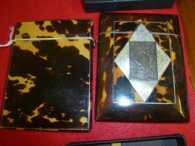 Appraisal: A VICTORIAN TORTOISESHELL MOTHER OF PEARL AND SILVER INLAID CARD