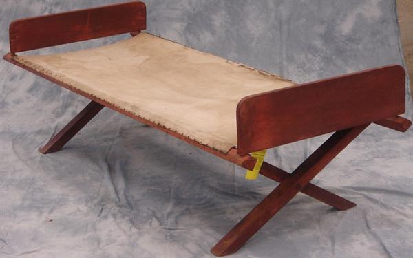 Appraisal: Folding th c field cot red painted surface removable head