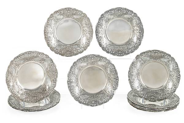 Appraisal: A set of twelve Continental standard silver saucers pseudo Parisian