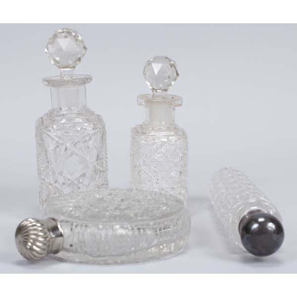 Appraisal: Group of Pressed and Cut Glass Baccarat Cologne Bottles Includes