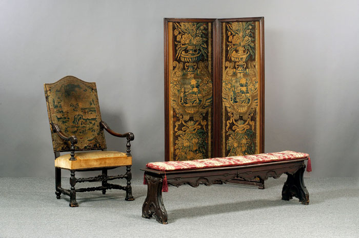 Appraisal: CONTINENTAL FLEMISH CARVED WALNUT ARMCHAIR WITH TAPESTRY The rectangular canted