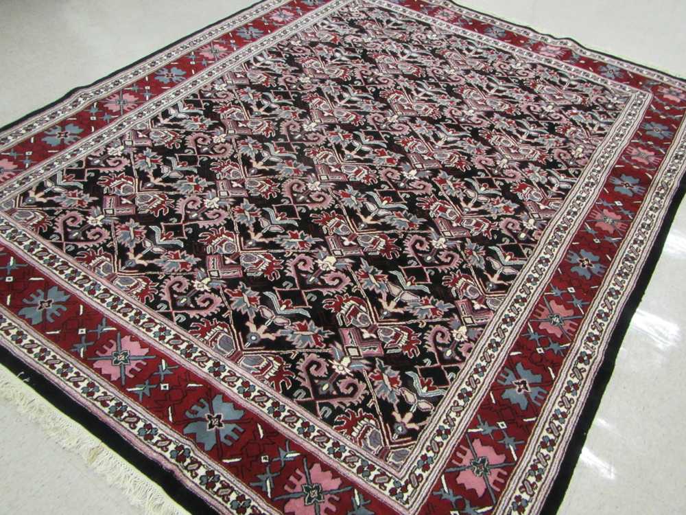 Appraisal: HAND KNOTTED ORIENTAL CARPET Indo-Persian overall repeating stylized floral design