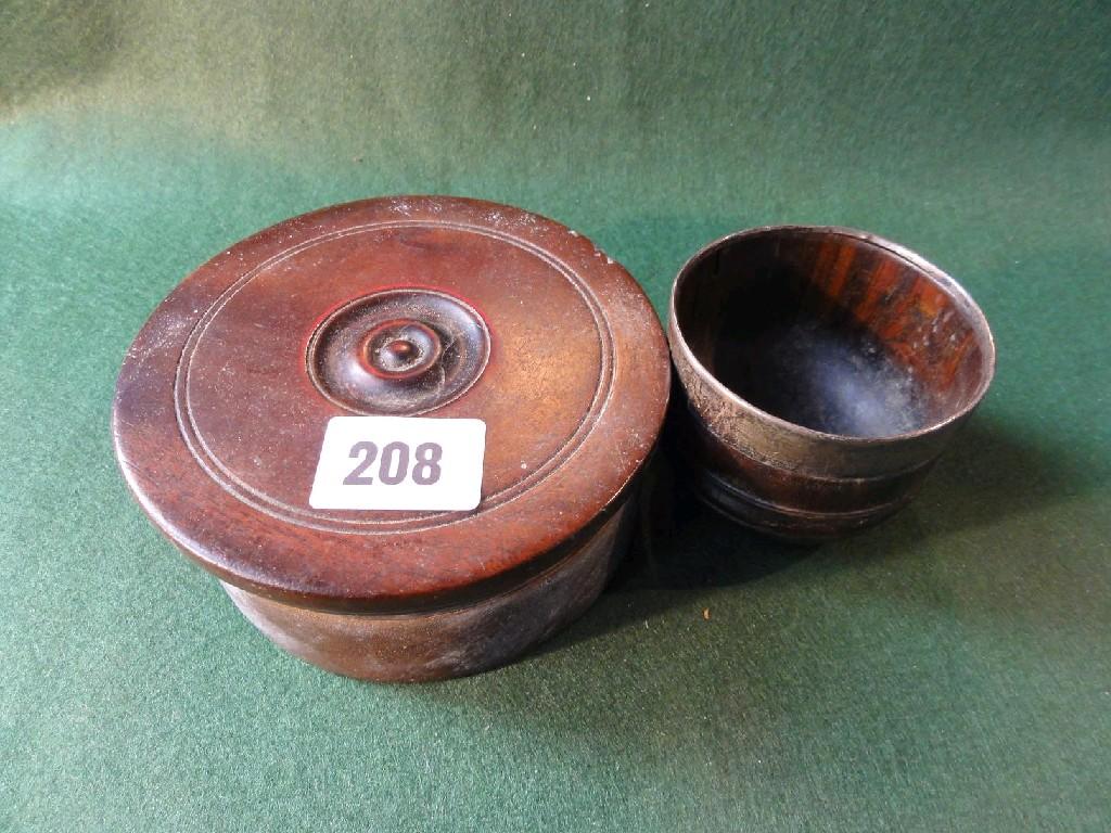 Appraisal: A Georgian mahogany box with turned lid together with a