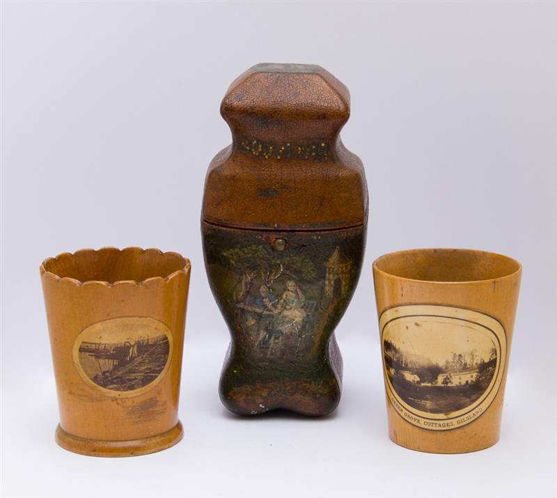 Appraisal: TWO SOUVENIR TREEN CUPS AND A PAINTED LEATHER CASE Each