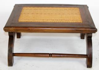 Appraisal: Mahogany and rattan footstool Mahogany and rattan footstool h x