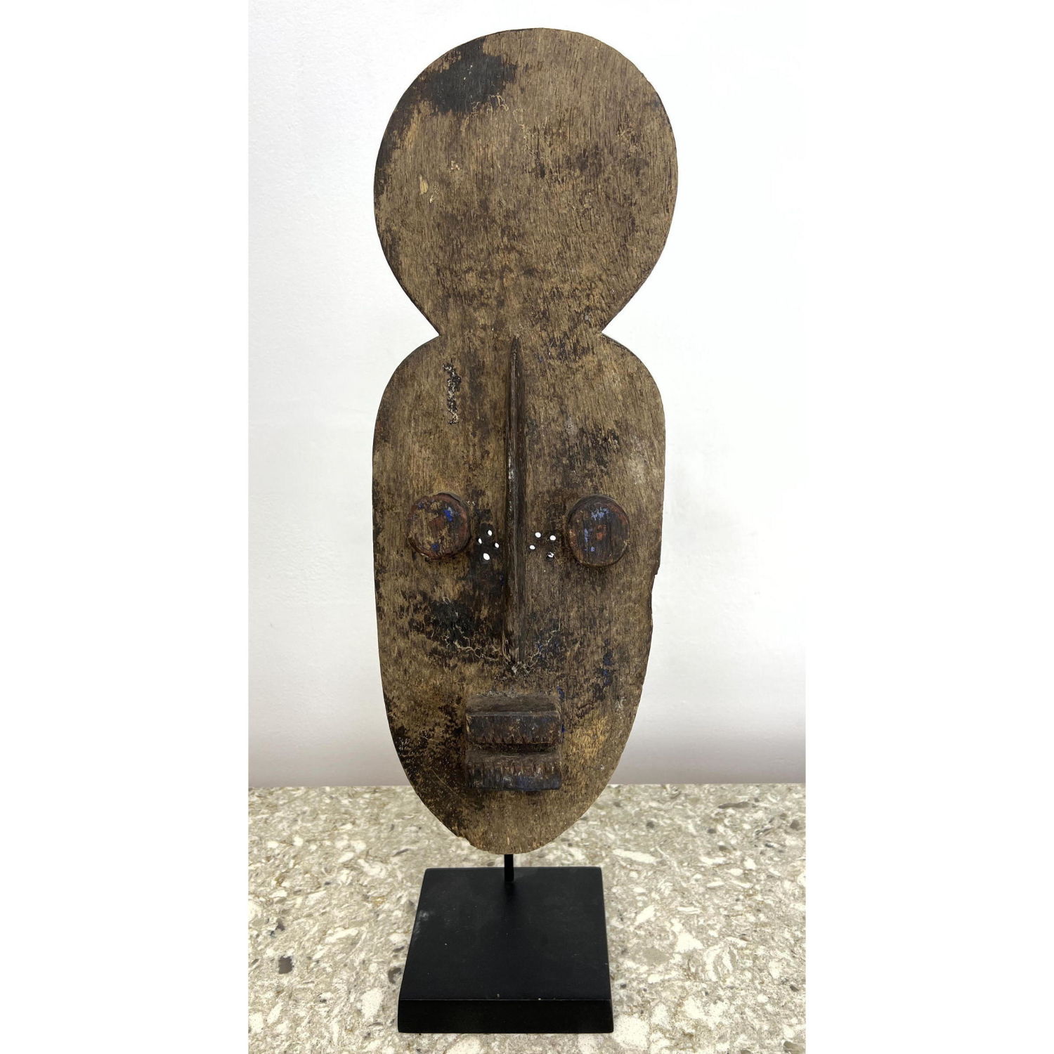 Appraisal: African tribal mask on custom stand Dimensions H inches W