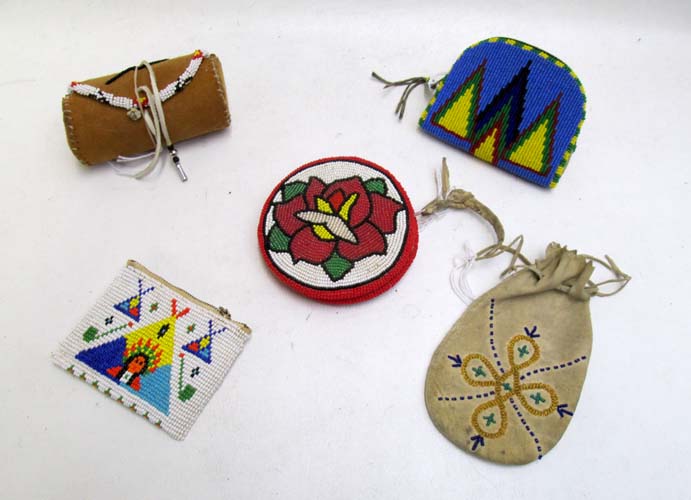 Appraisal: FIVE MODERN NATIVE AMERICAN BAGS all are decorated with glass