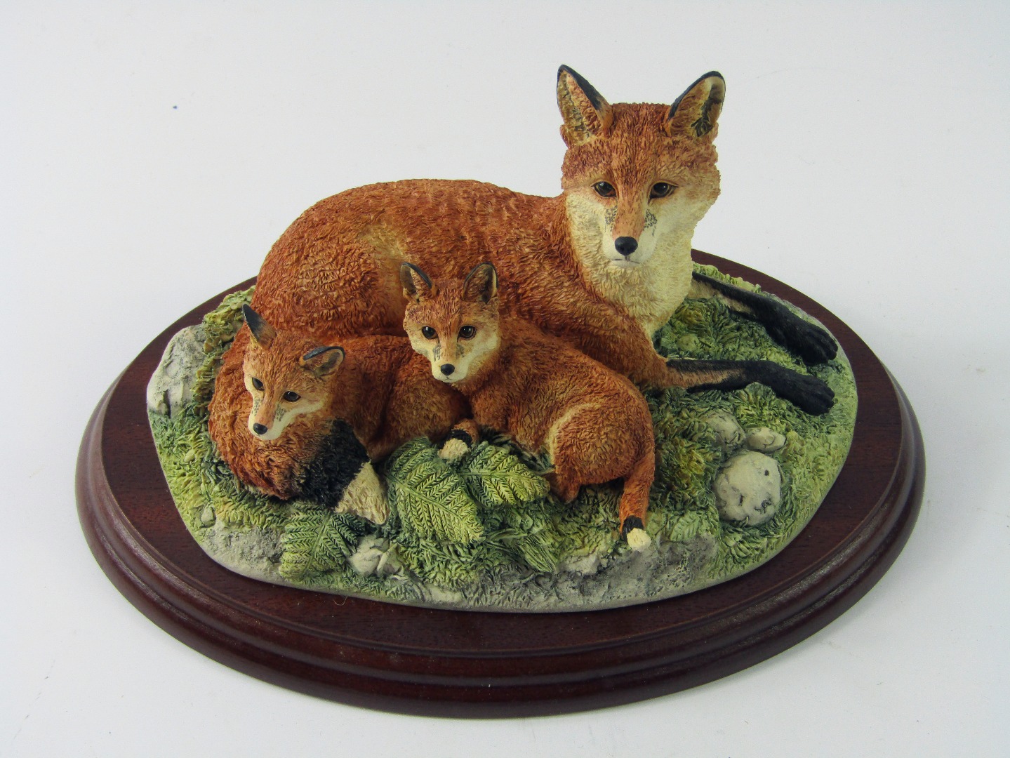 Appraisal: A Border Fine Arts figure Family Portrait of foxes B