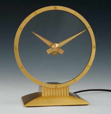 Appraisal: Jefferson Electric Company Golden Hour Mystery Clock Deco style brass