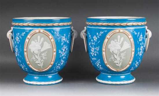 Appraisal: Pair of French porcelain cachepots with inset jasperware style plaques