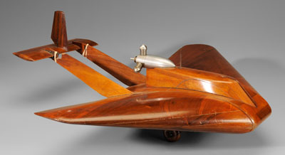 Appraisal: Delta Pusher wind-tunnel aircraft model glued layers of mahogany carved