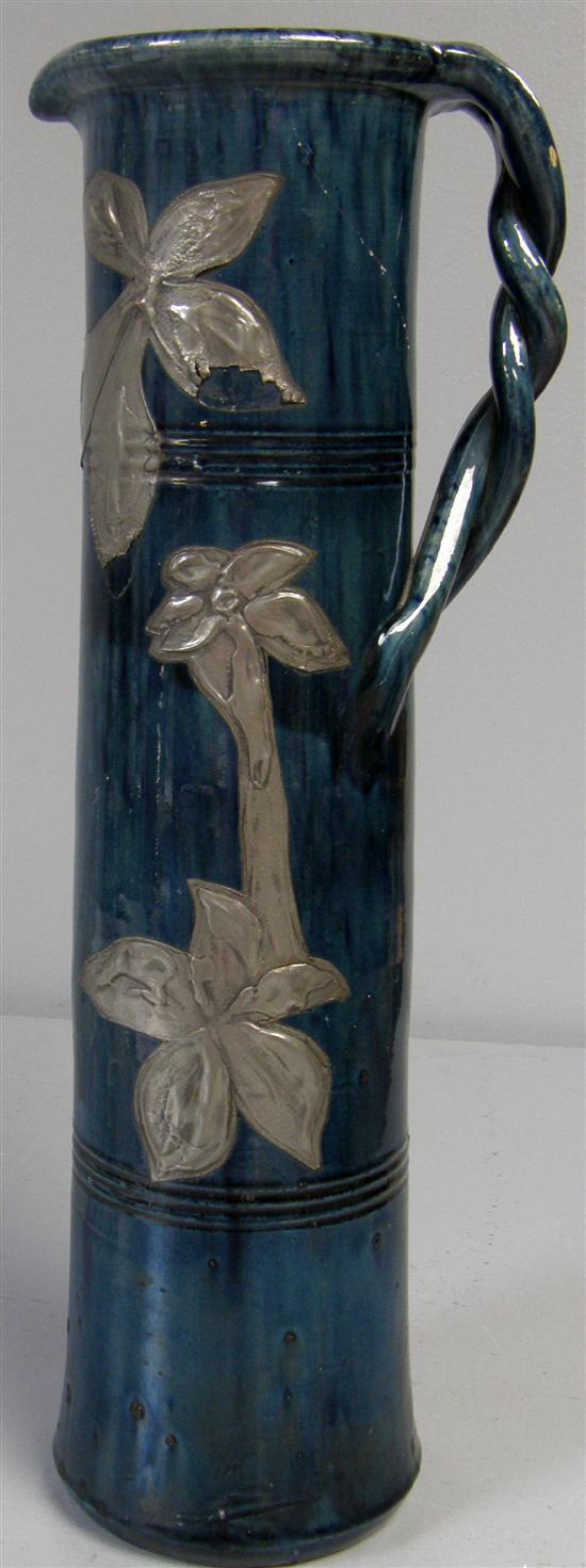 Appraisal: Nineteenth century art pottery blue glazed jug with applied pewter