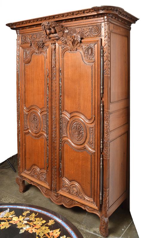 Appraisal: A LOUIS XVI STYLE OAK ARMOIRE the moulded cornice above