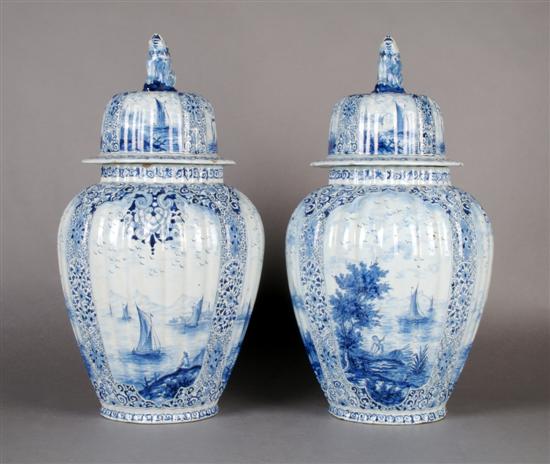 Appraisal: A Pair of Continental Vases and Covers Height inches