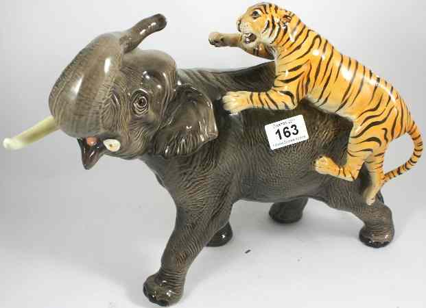 Appraisal: Beswick Elephant and Tiger Model one tusk broken but present