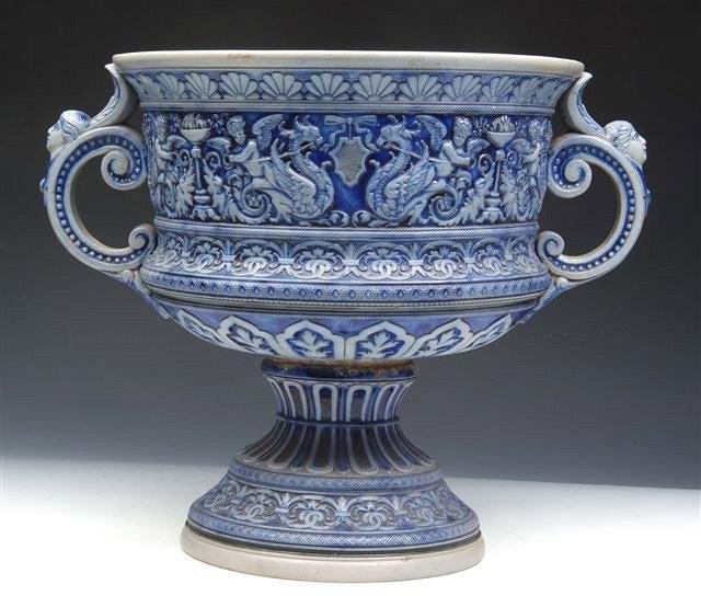 Appraisal: A WESTERWALD LARGE TWO HANDLED CLASSICAL URN with a copy