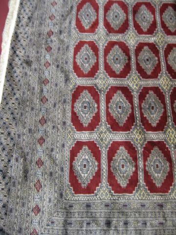 Appraisal: Bokara Pakistan Handmade Room Size Rug panels of geometrics countless