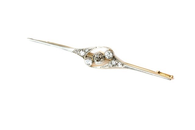 Appraisal: A gold and platinum fronted and diamond set bar brooch