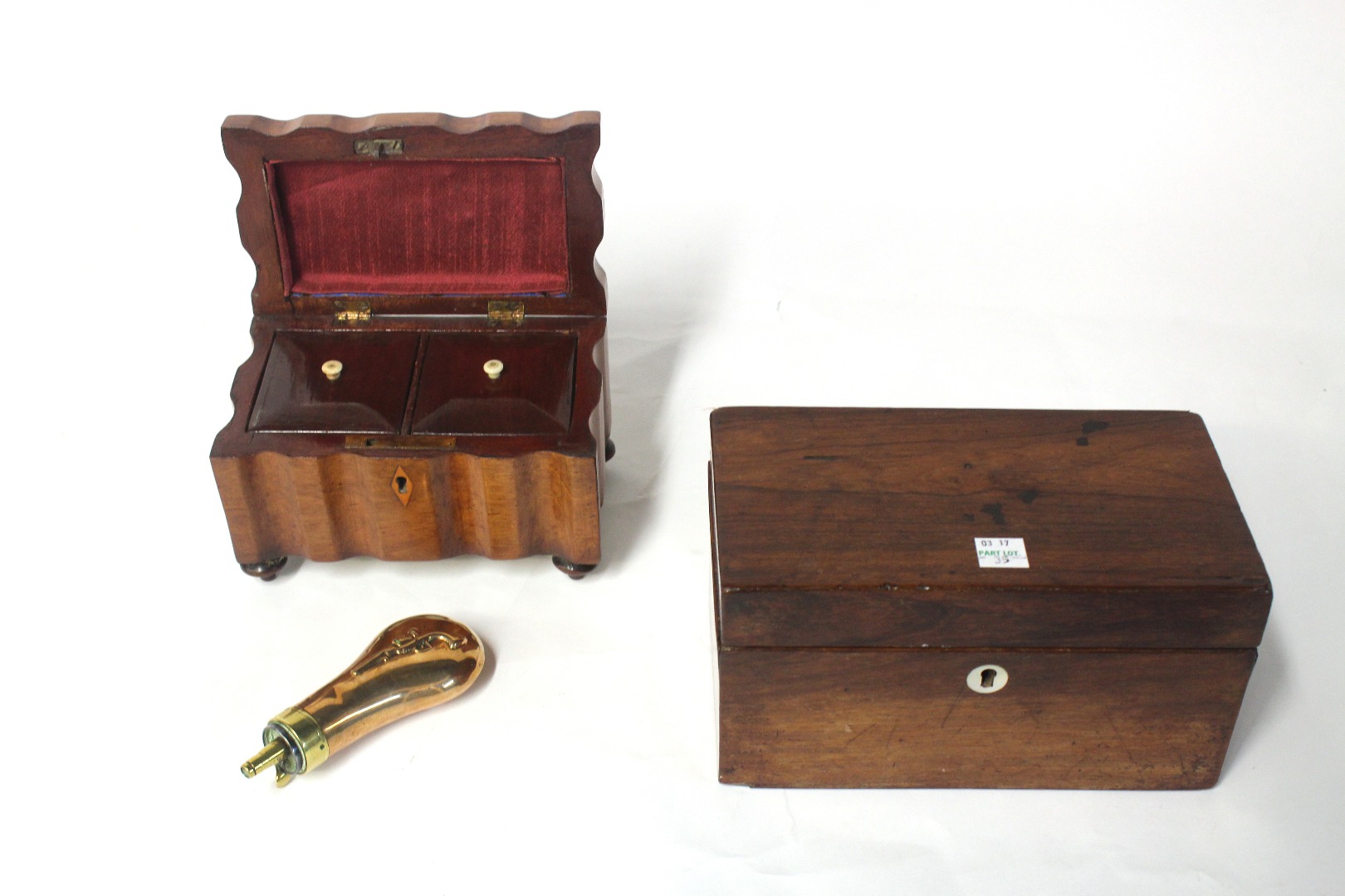 Appraisal: An early Victorian mahogany tea caddy of shaped outline cm