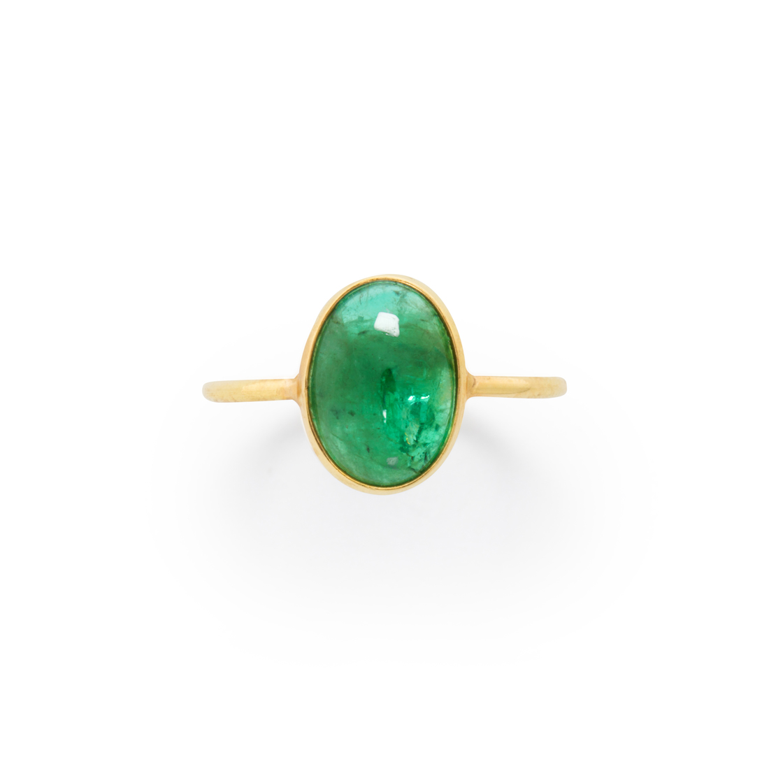 Appraisal: AN EMERALD AND EIGHTEEN KARAT GOLD RING An emerald and