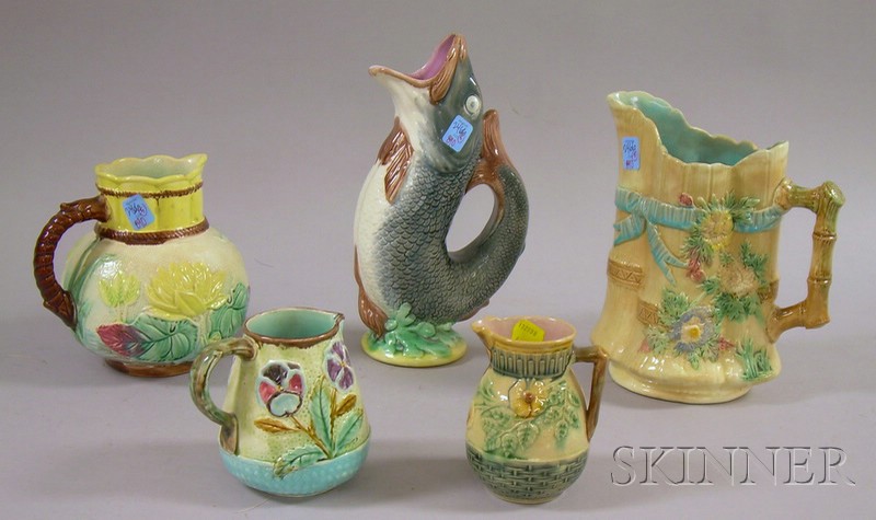 Appraisal: Five Majolica Decorated Jugs two small floral a gurgling fish