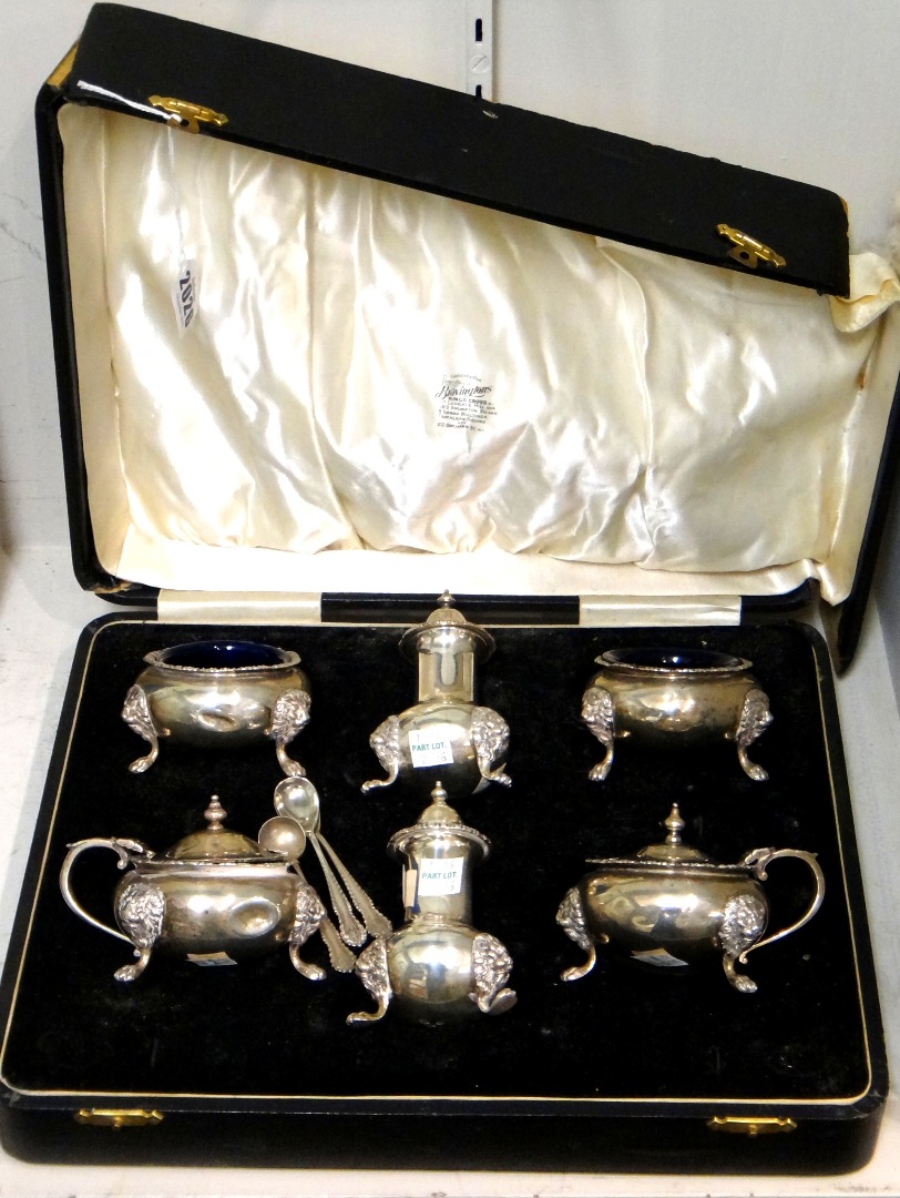 Appraisal: A silver six piece matched condiment set comprising two mustard