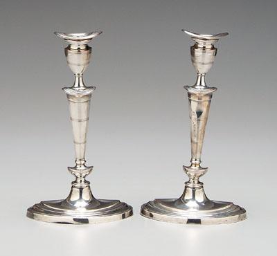 Appraisal: Pair English silver candlesticks silver plated with oval stepped bases