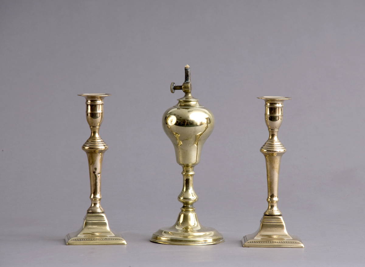 Appraisal: PAIR OF TAPERED BRASS CANDLESTICKS AND A WHALE OIL LAMP