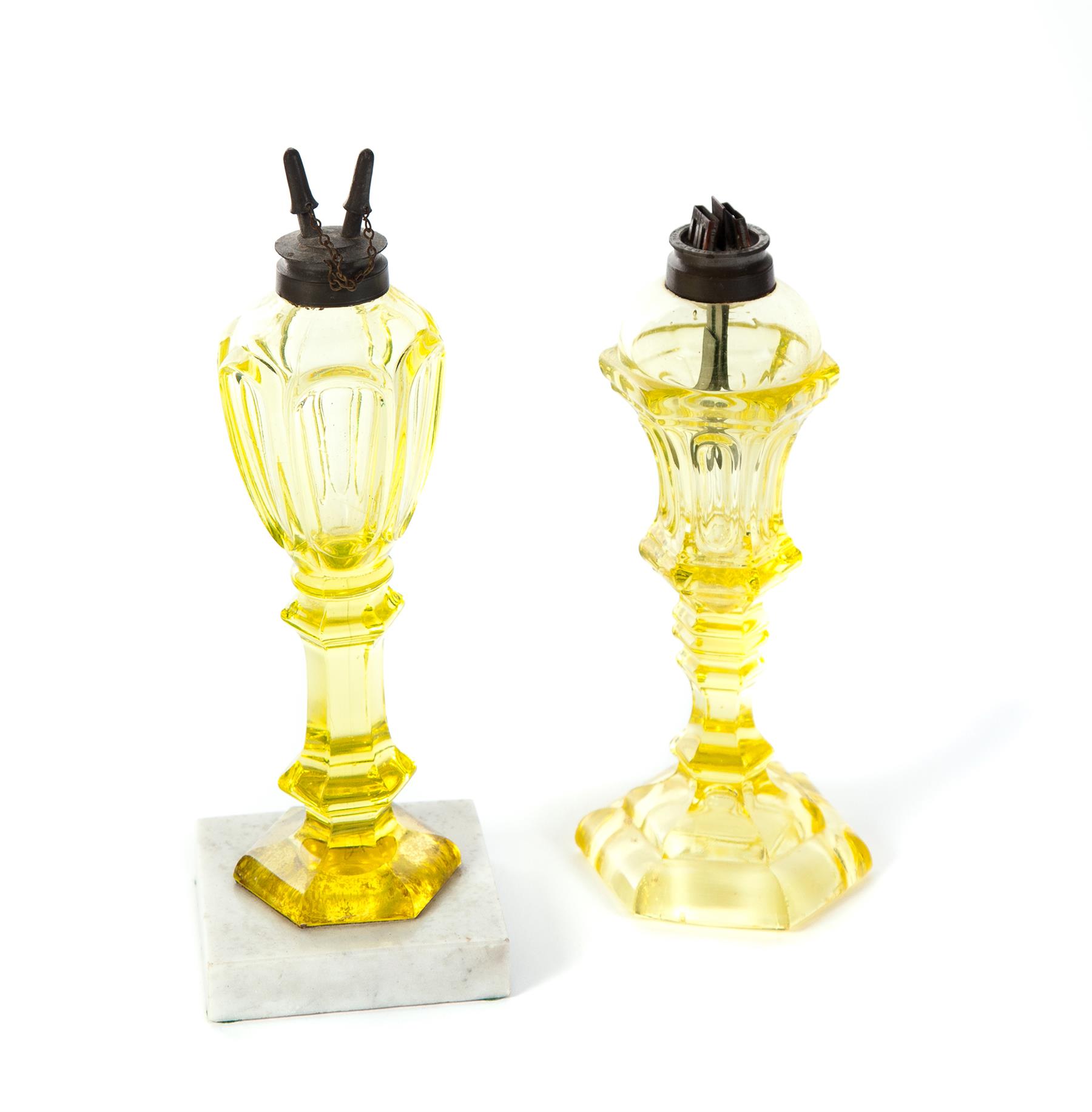 Appraisal: TWO AMERICAN CANARY GLASS OIL LAMPS Mid th century Loop