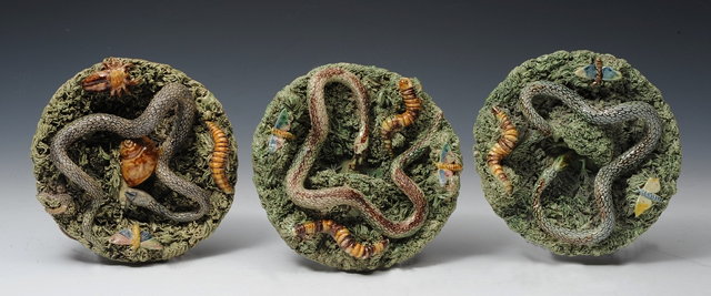 Appraisal: A SET OF THREE PORTUGUESE PALISSY STYLE SMALL CHARGERS the